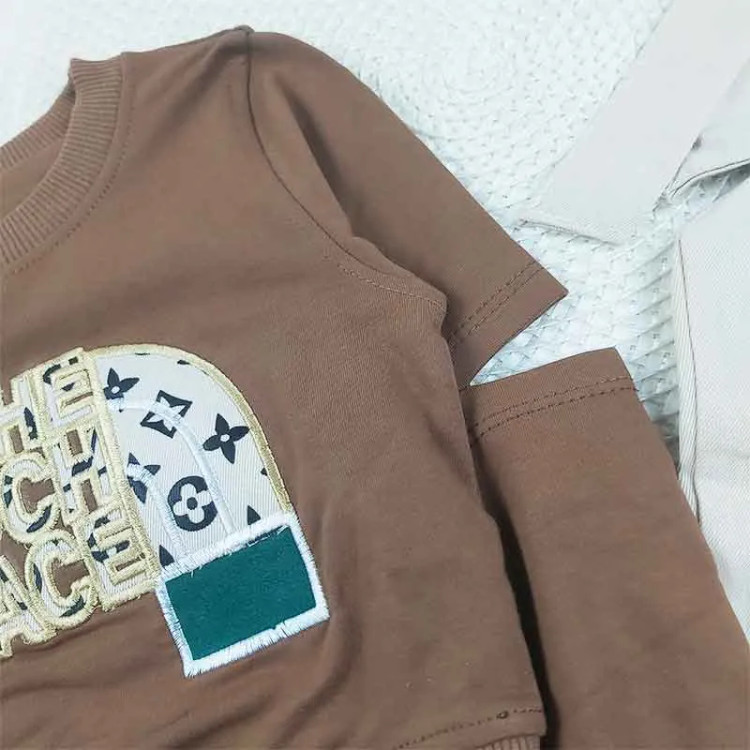 ست دخترانه کراپ یقه گرد پنبهای و شلوار کتان بگ مدل آستین فینگردار