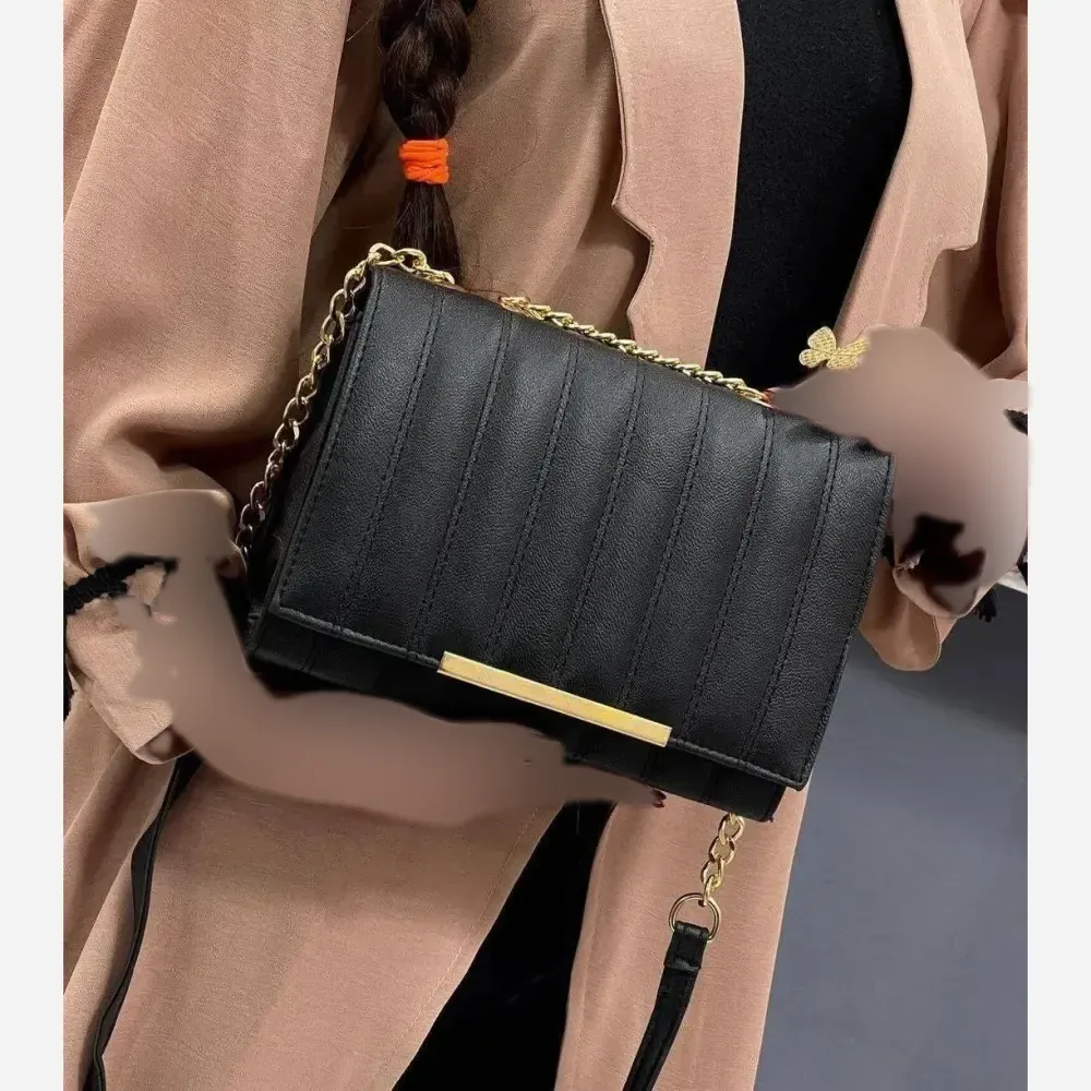 کیف چرمی زنانه مدل سیما رنگ مشکی سایز 20 در 15 سانتیمتر