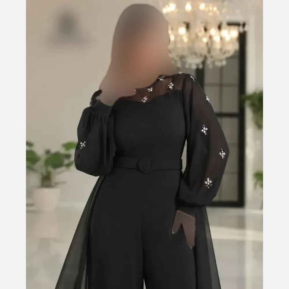 اورال مجلسی زنانه مدل جسیکا جنس کرپ حریر و غواصی نگیندوزی شده با کمربند دنبالهدار سایز 38 تا 48