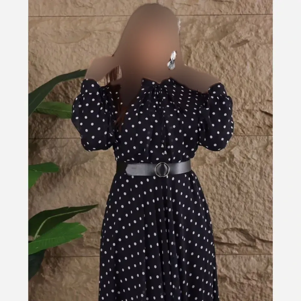 پیراهن زنانه مجلسی طرح توپی جنس بوگاتی مشکی فری سایز تا 46
