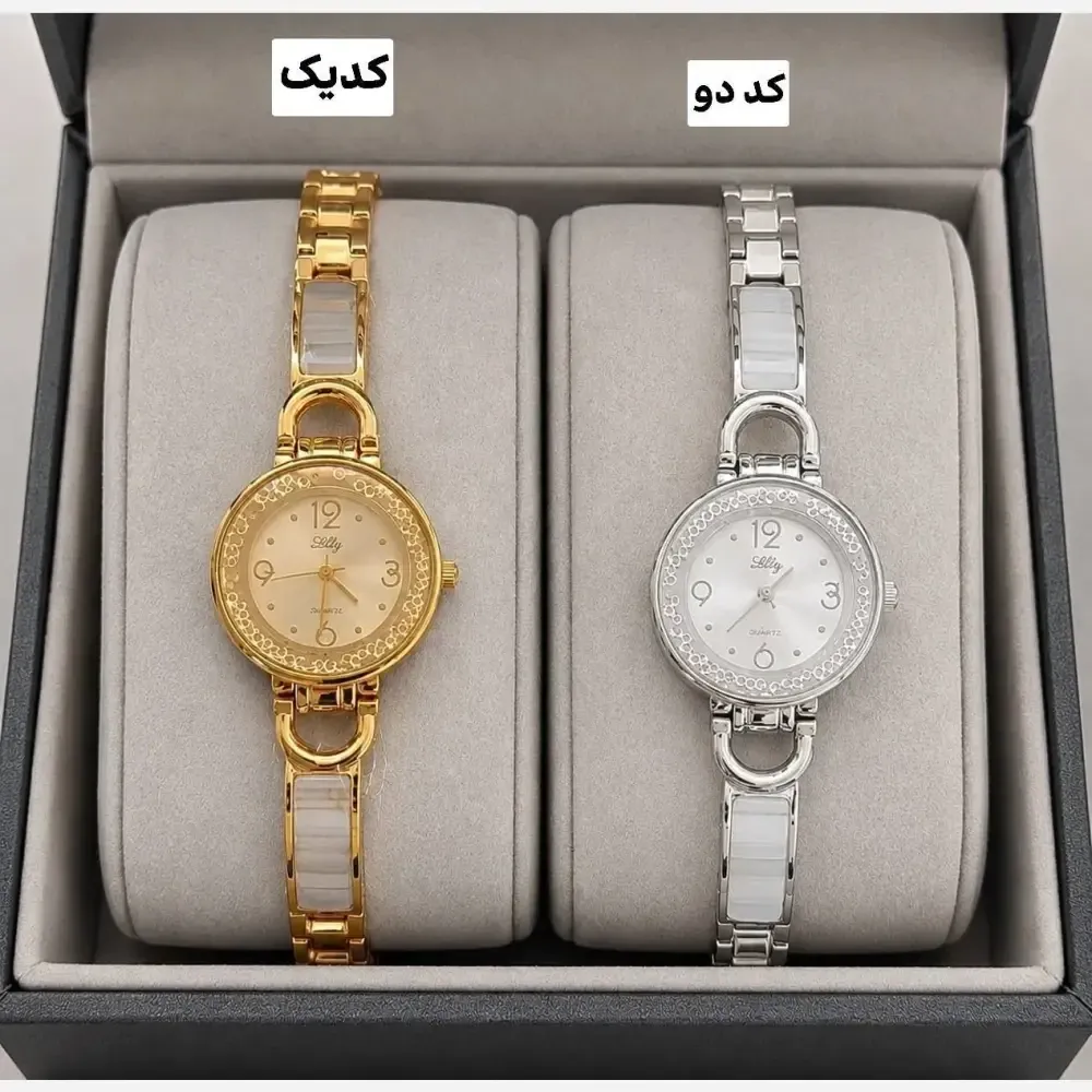 ساعت زنانه بند طلایی و نقره ای صفحه سفید و طلایی دور قاب نگین طرح سرامیکی بند استیل