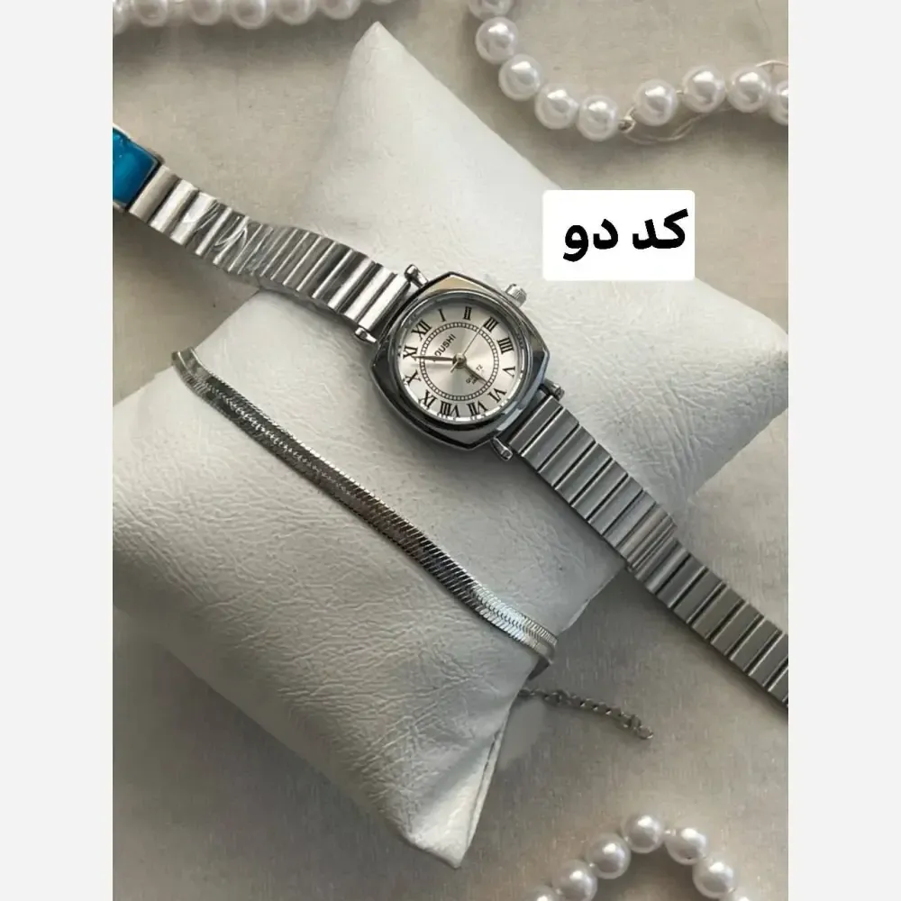 ست ساعت مچی زنانه کوشی و دستبند استیل بند کرکره ای با جعبه کادویی