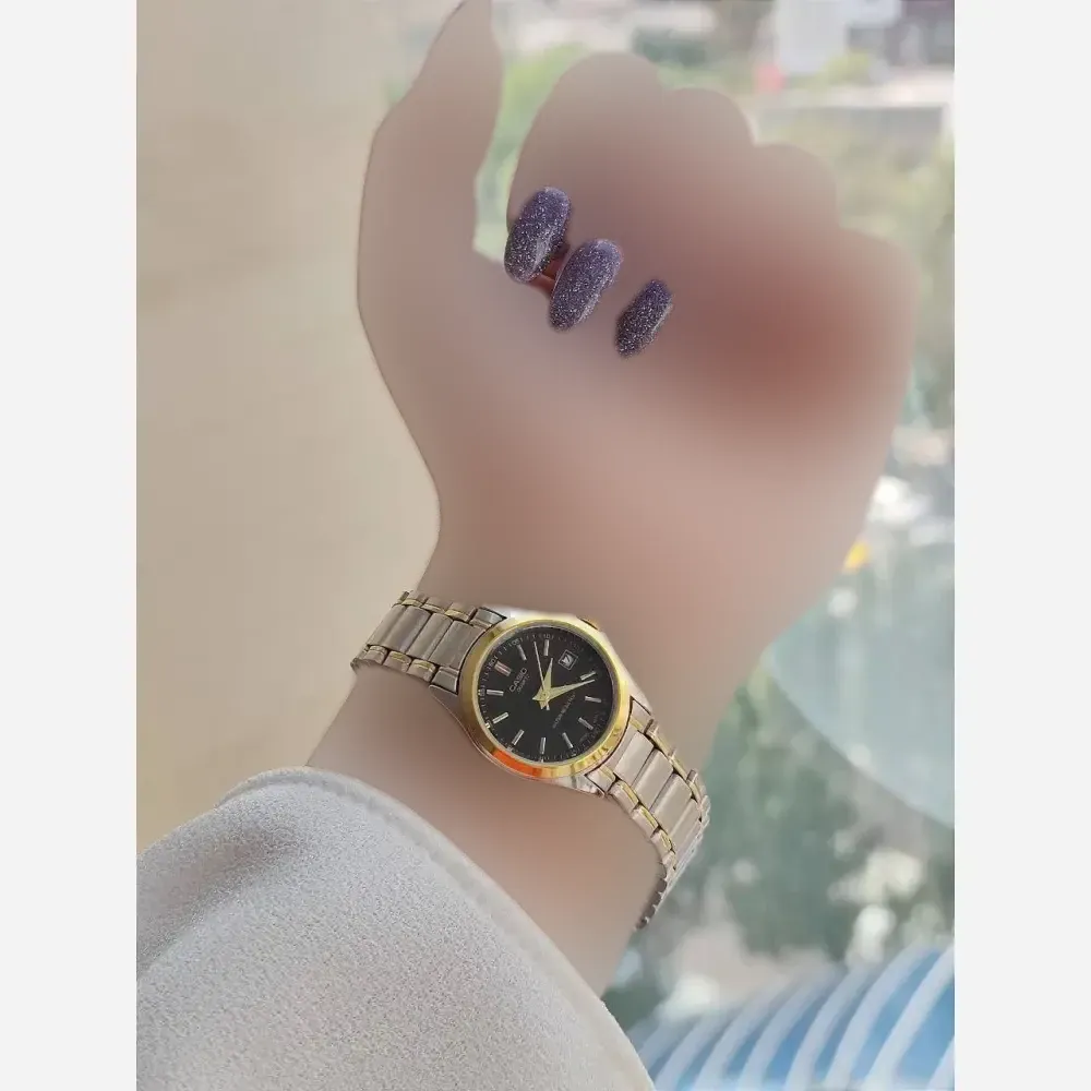 ساعت کاسیو بند استیل نقره ای طلایی صفحه مشکی تقویم دار با جعبه و گارانتی